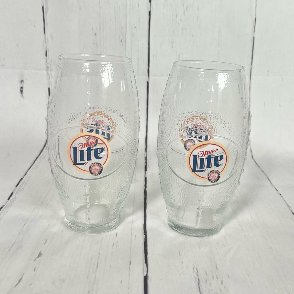 Two Miller Lite football pint glasses game beer
